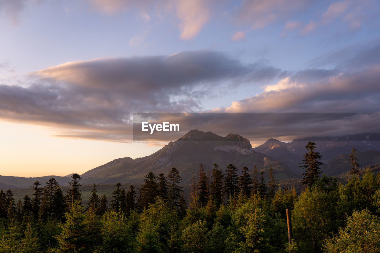 Scenic view of mountains against sky during sunset