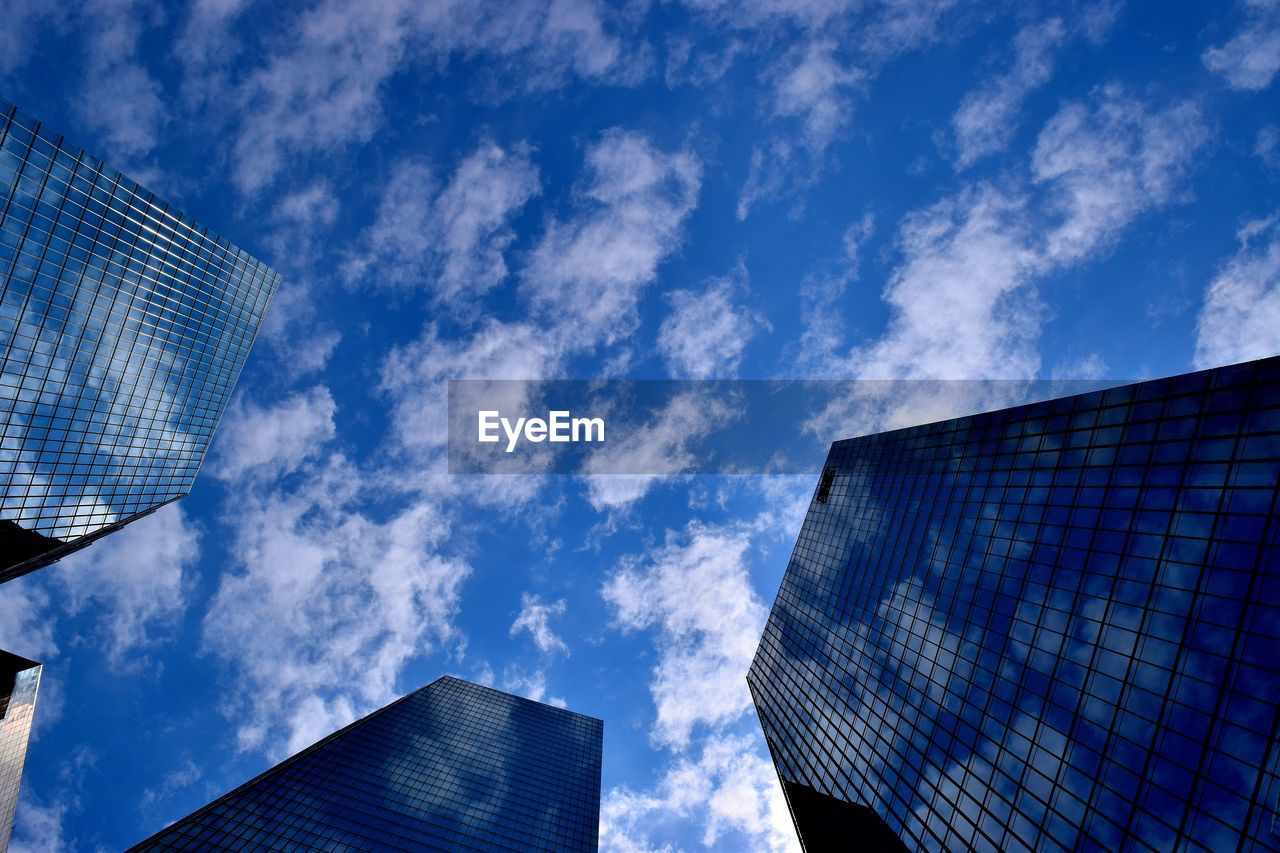 LOW ANGLE VIEW OF BUILDINGS AGAINST SKY