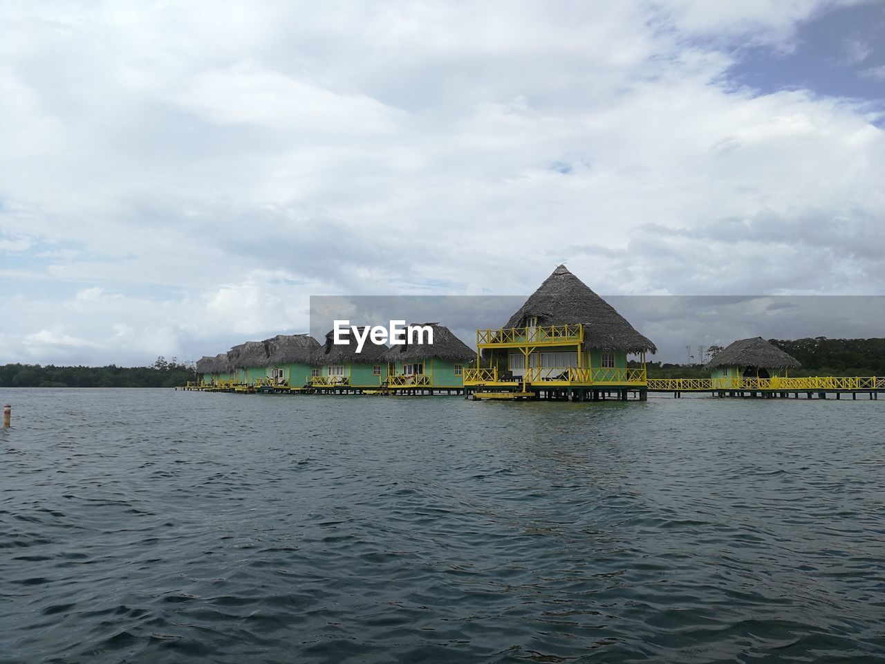 water, architecture, built structure, sky, cloud, building exterior, sea, building, nature, bay, house, travel destinations, boating, vehicle, day, shore, no people, outdoors, travel, waterfront, coast, scenics - nature, tourism, beauty in nature