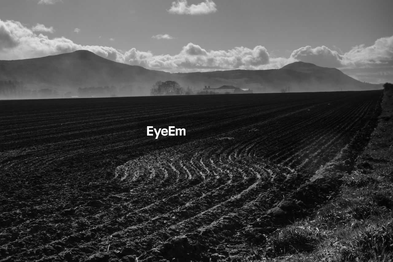 Dust storm seen across the fields to the lomond hills, fife