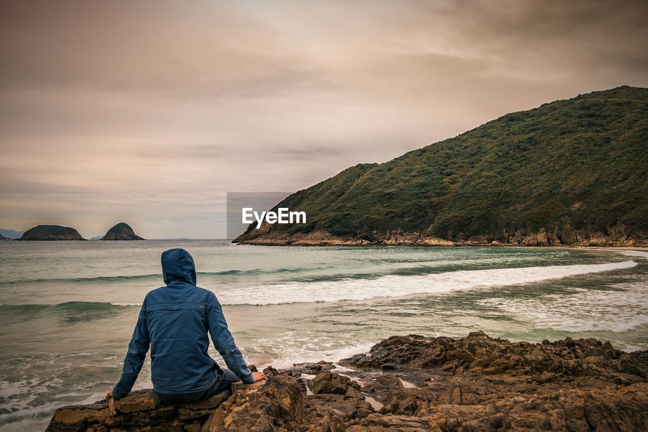 Rear view of man on beach