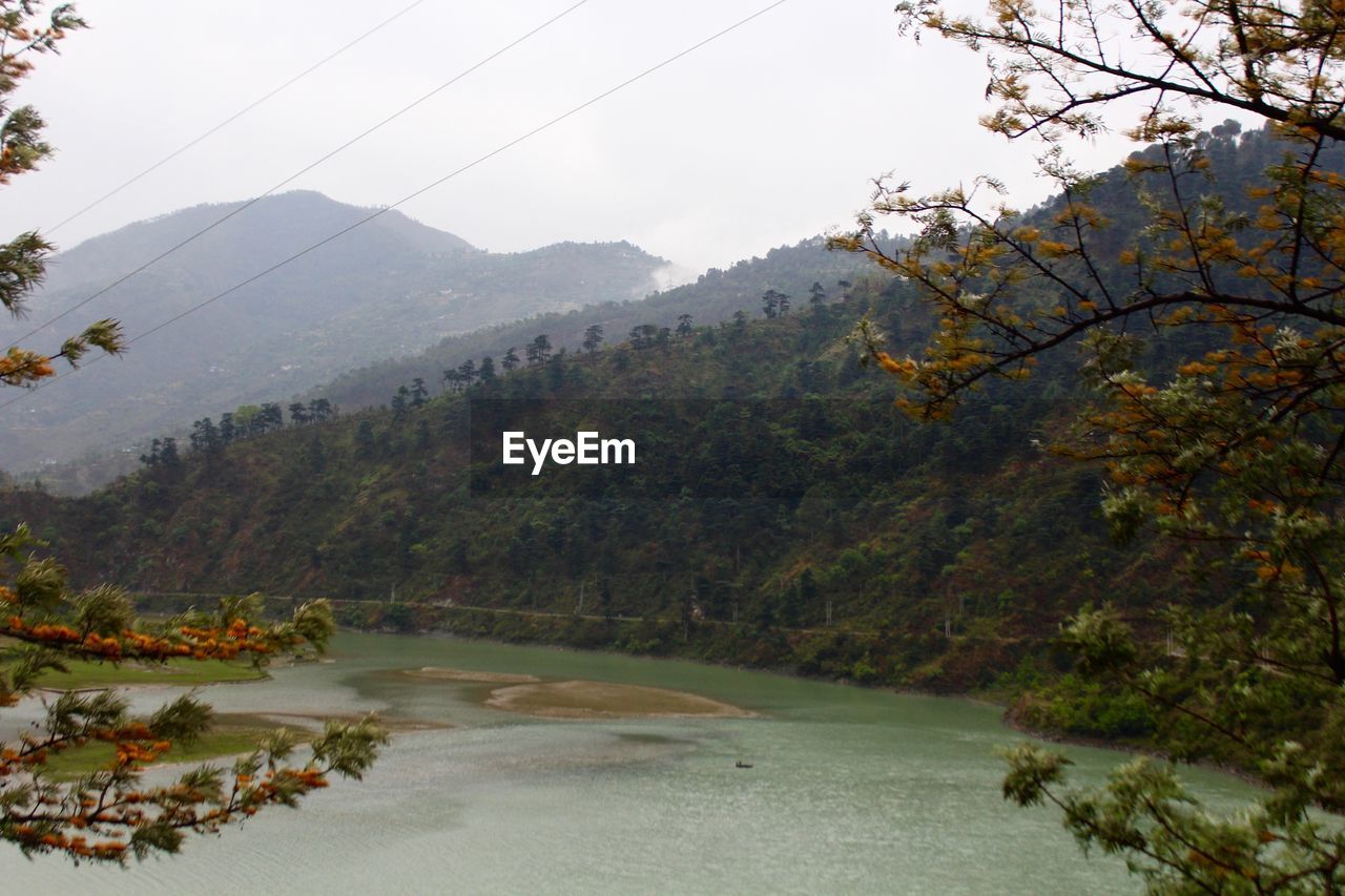 SCENIC VIEW OF MOUNTAIN AGAINST SKY