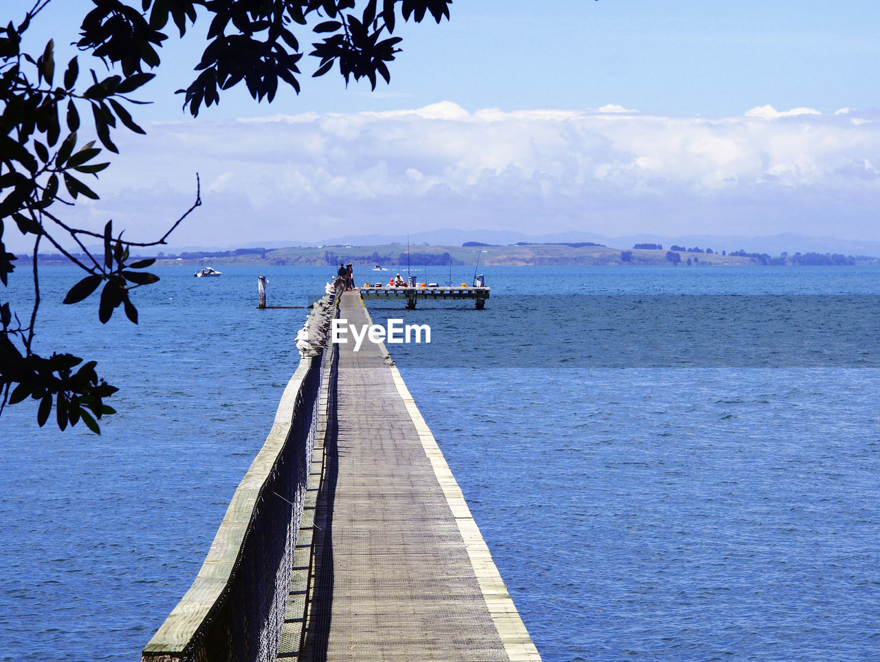 SCENIC VIEW OF JETTY AGAINST SKY