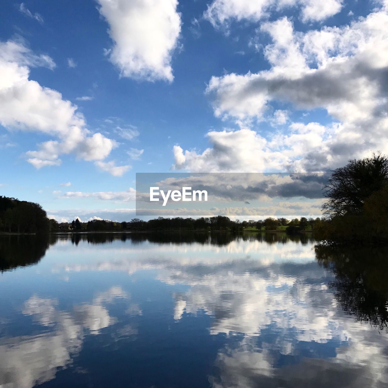 REFLECTION OF CLOUDS IN LAKE