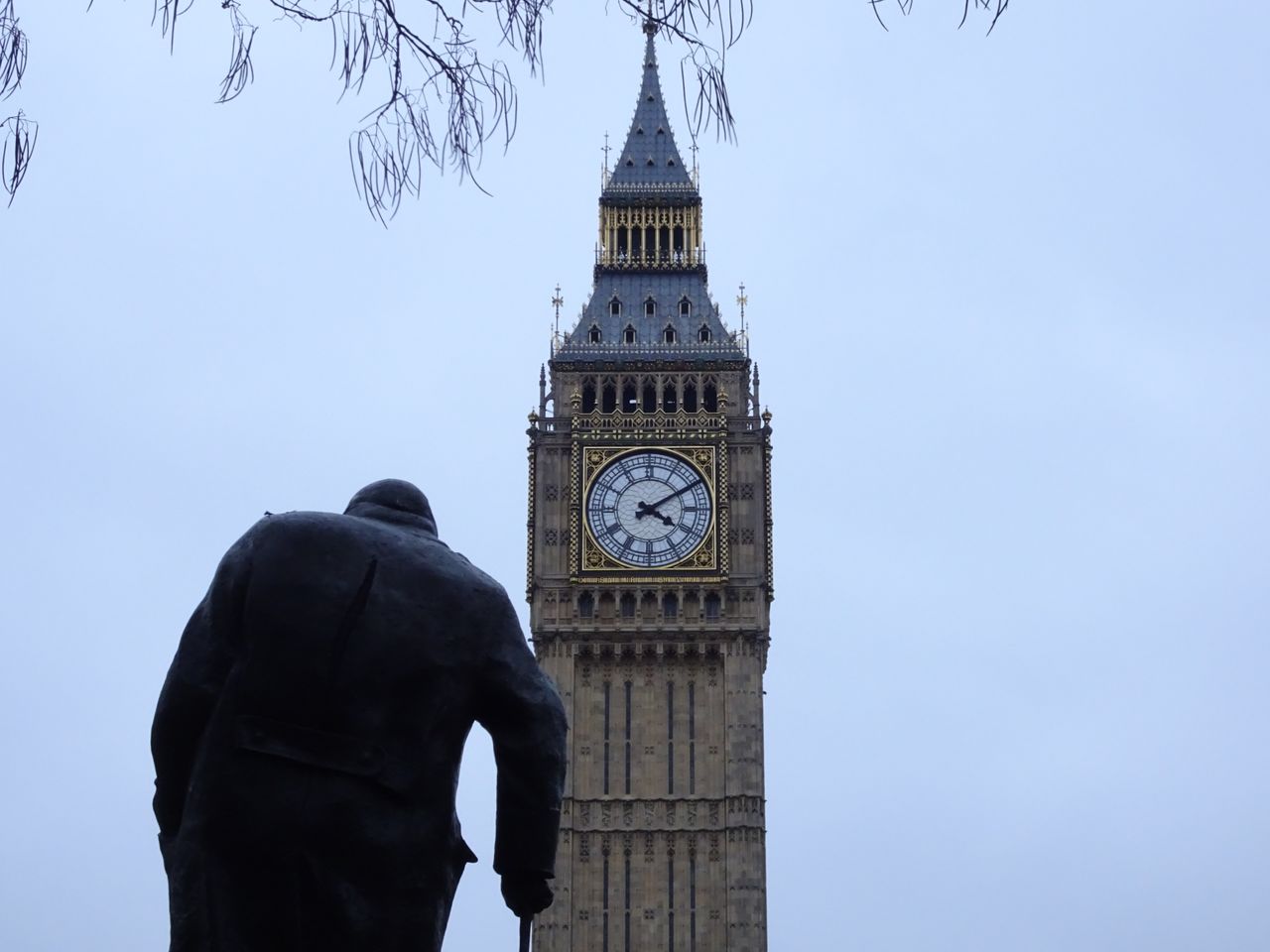 LOW ANGLE VIEW OF A CLOCK TOWER