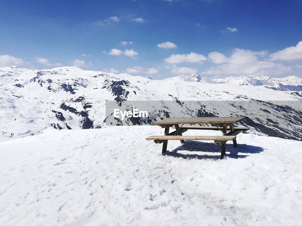 Scenic view of snowcapped mountain against sky during winter