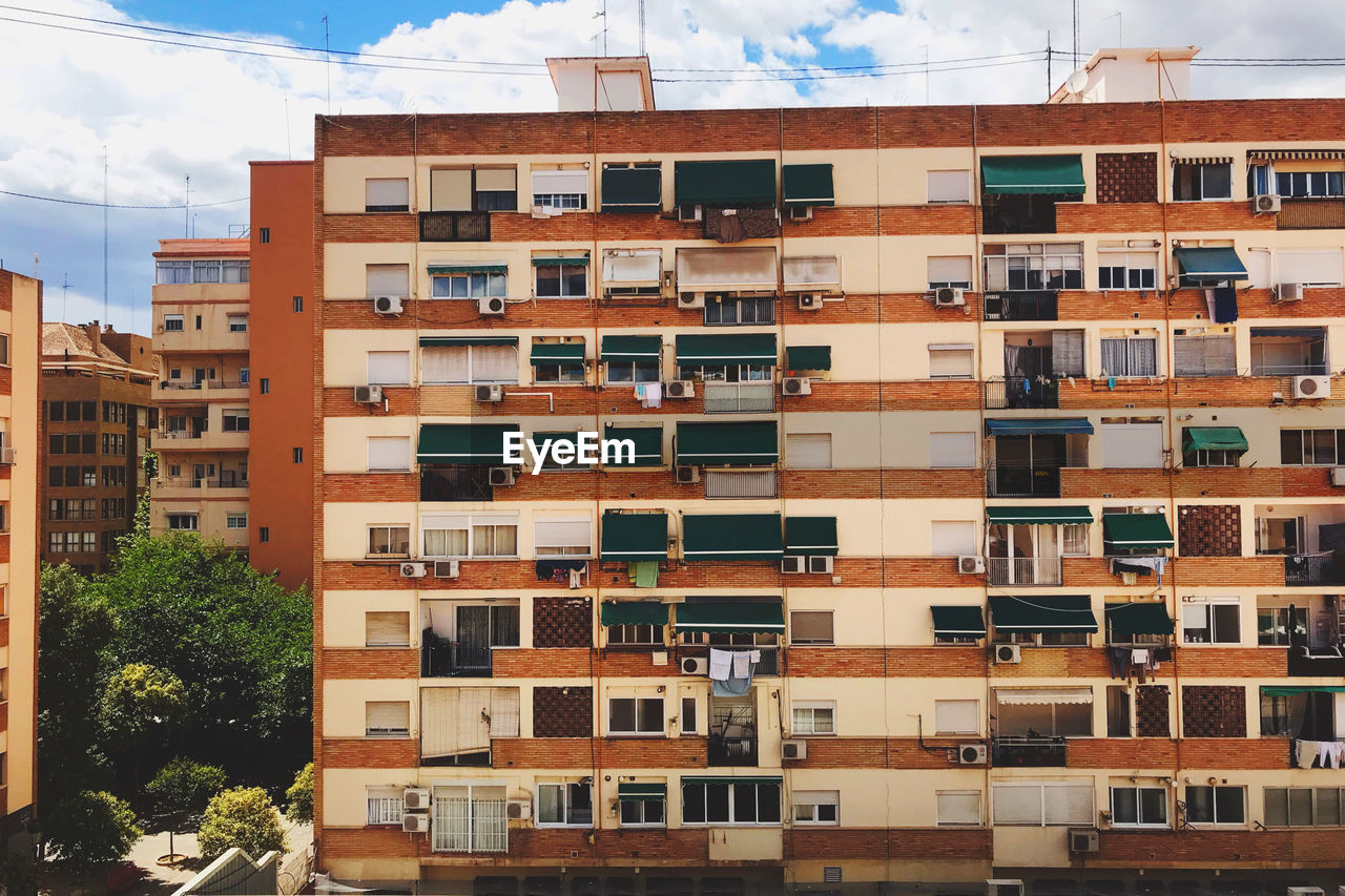 Low angle view of residential building against sky