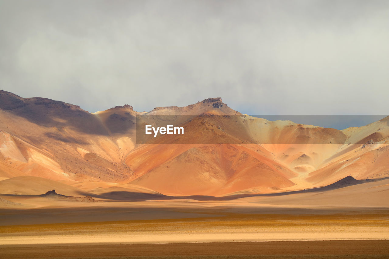 Scenic view of desert against sky