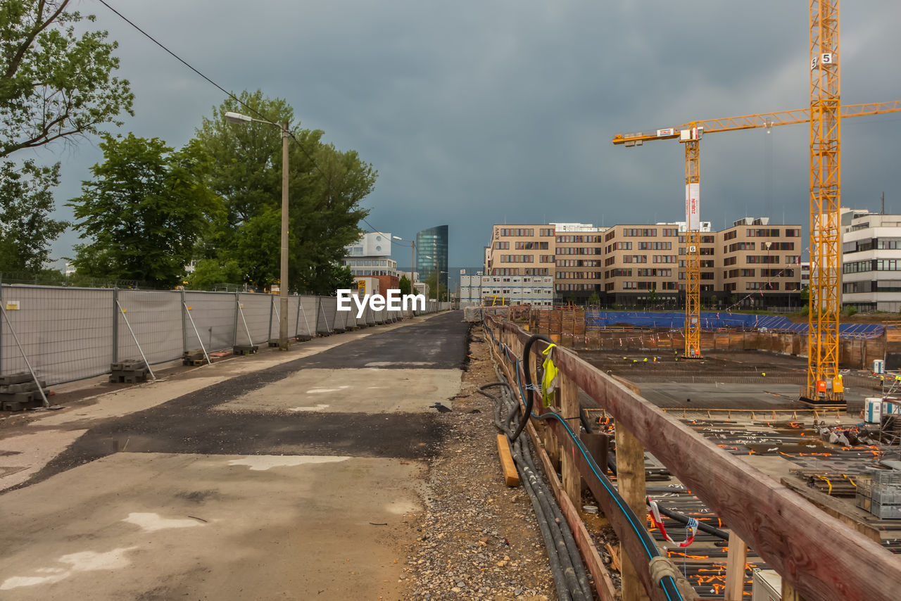 VIEW OF RAILROAD TRACKS AGAINST SKY