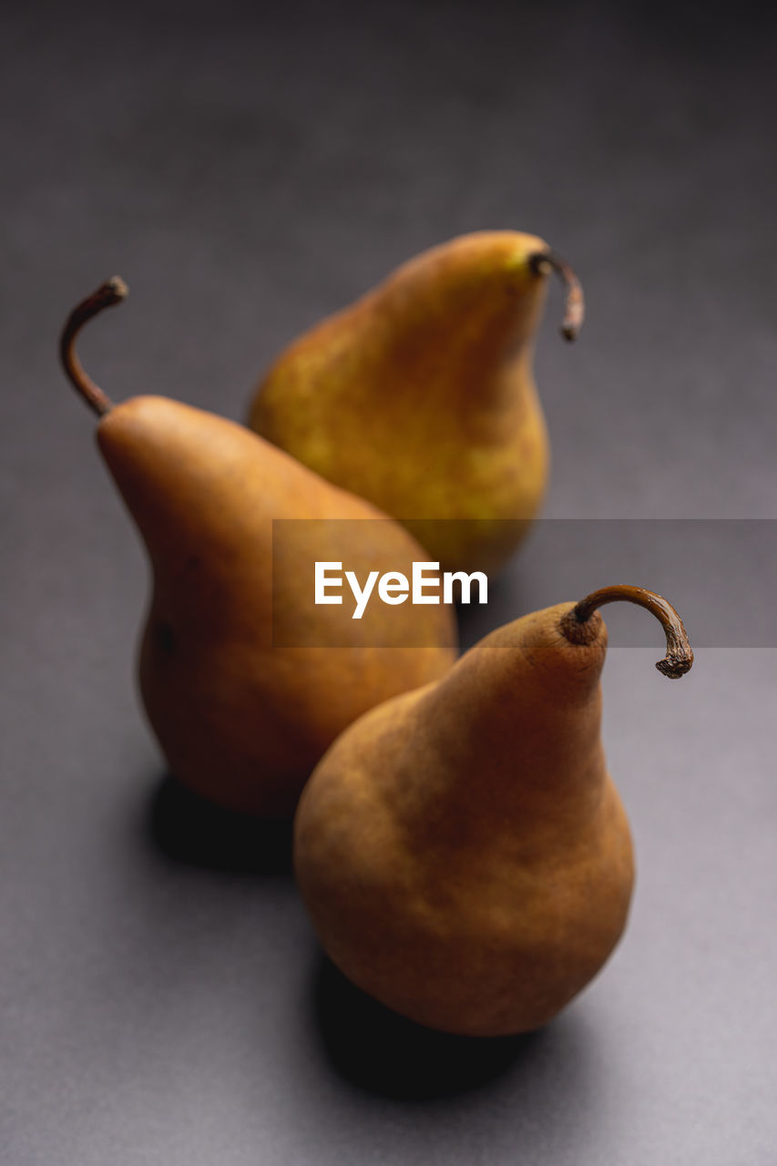 Close-up of pears fruit on table