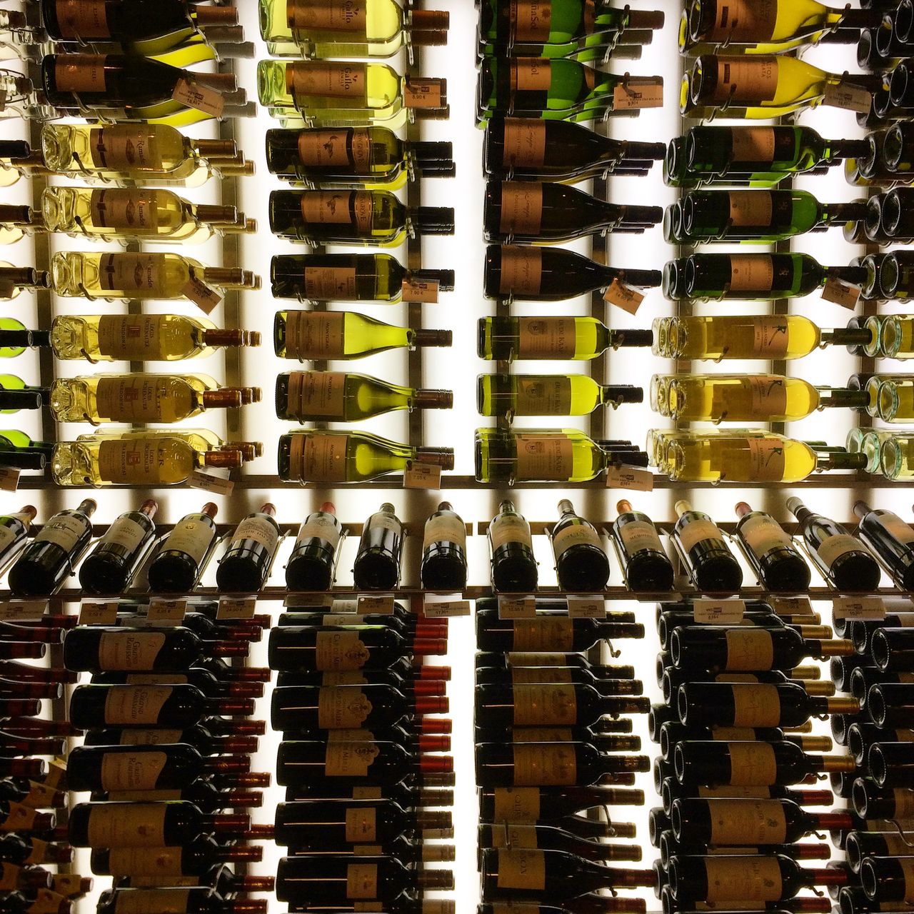 Wine bottles on shelves