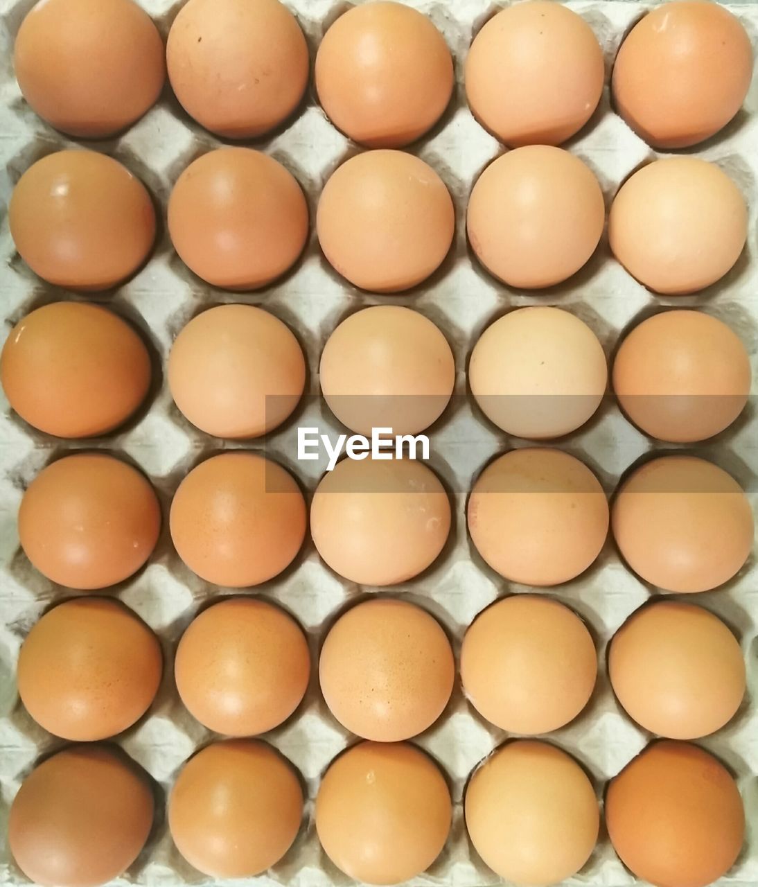 Full frame shot of eggs in carton