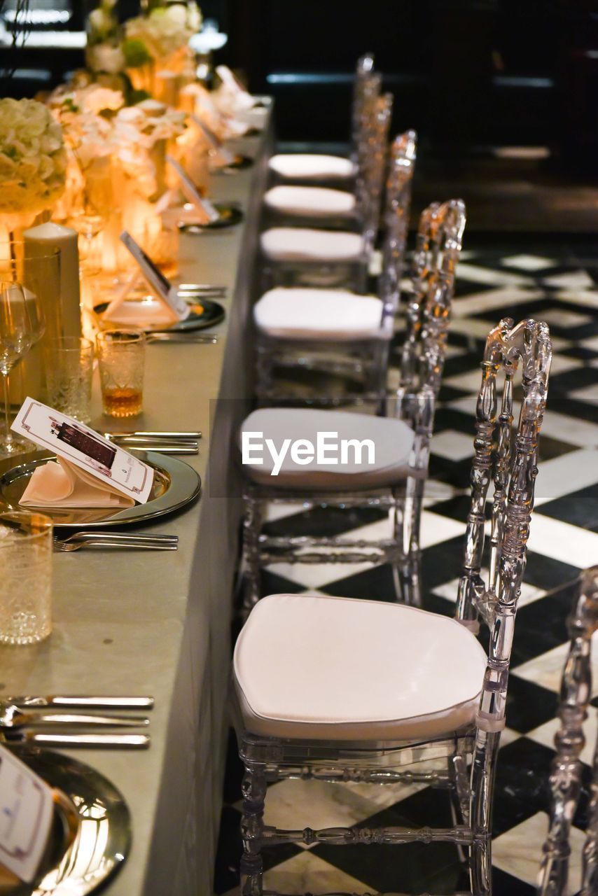 High angle view of chairs and table in restaurant