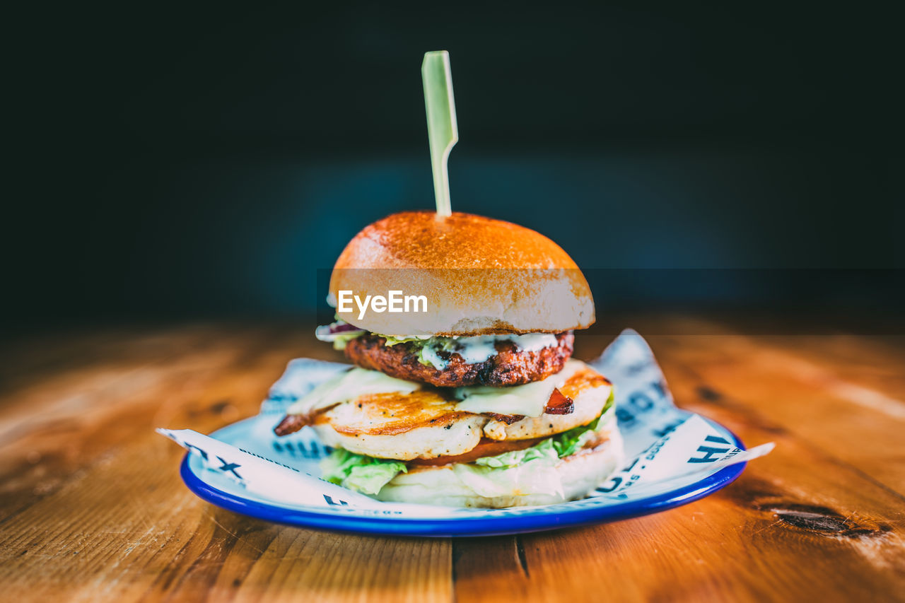 Close-up of burger in plate on table