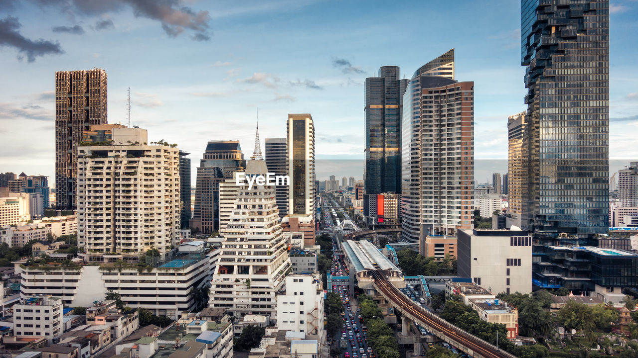 High angle view of buildings in city against sky