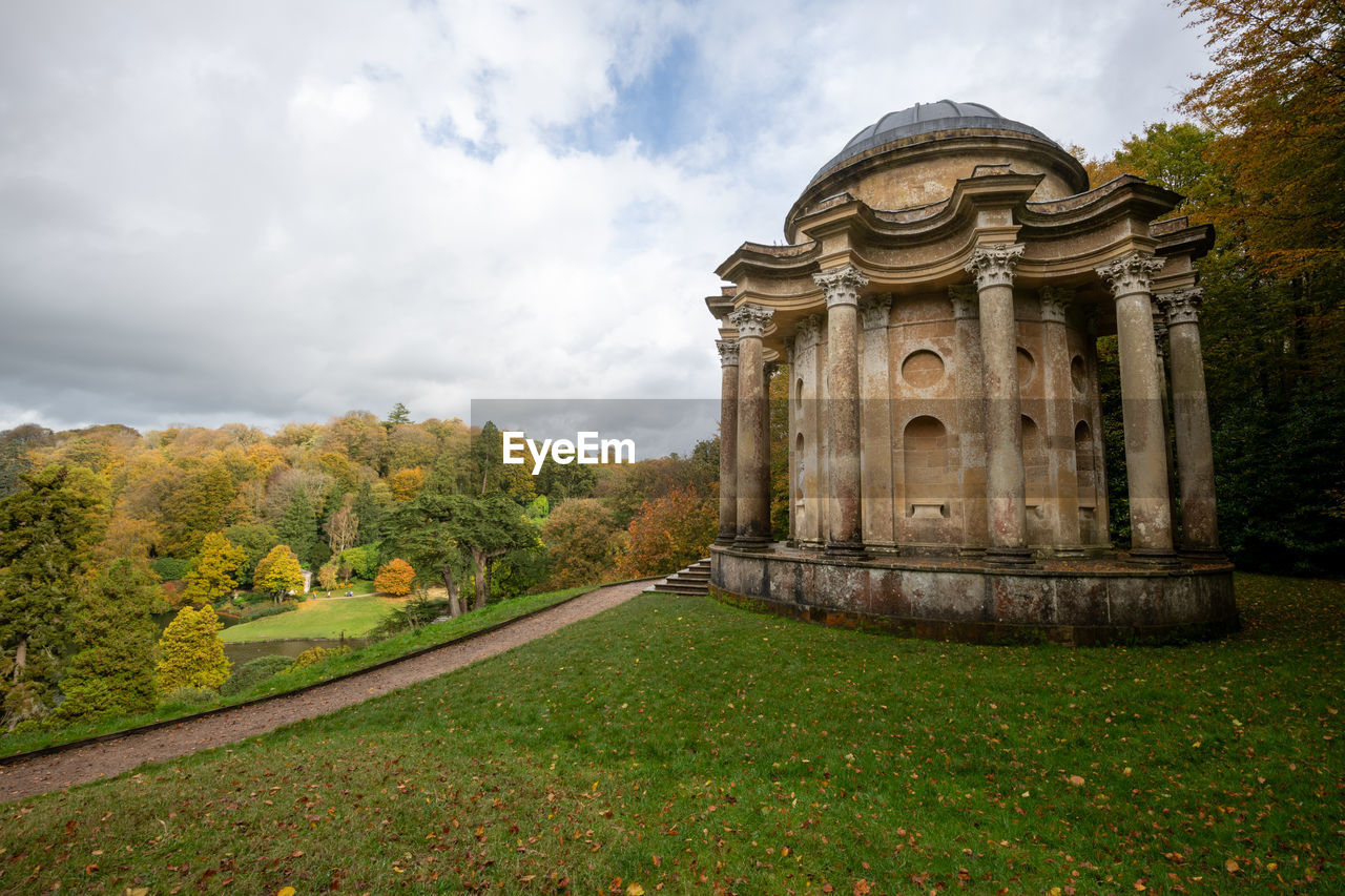 Autumn colours at stourhead can be viewed from the temple of apollo in stourhead gardens.