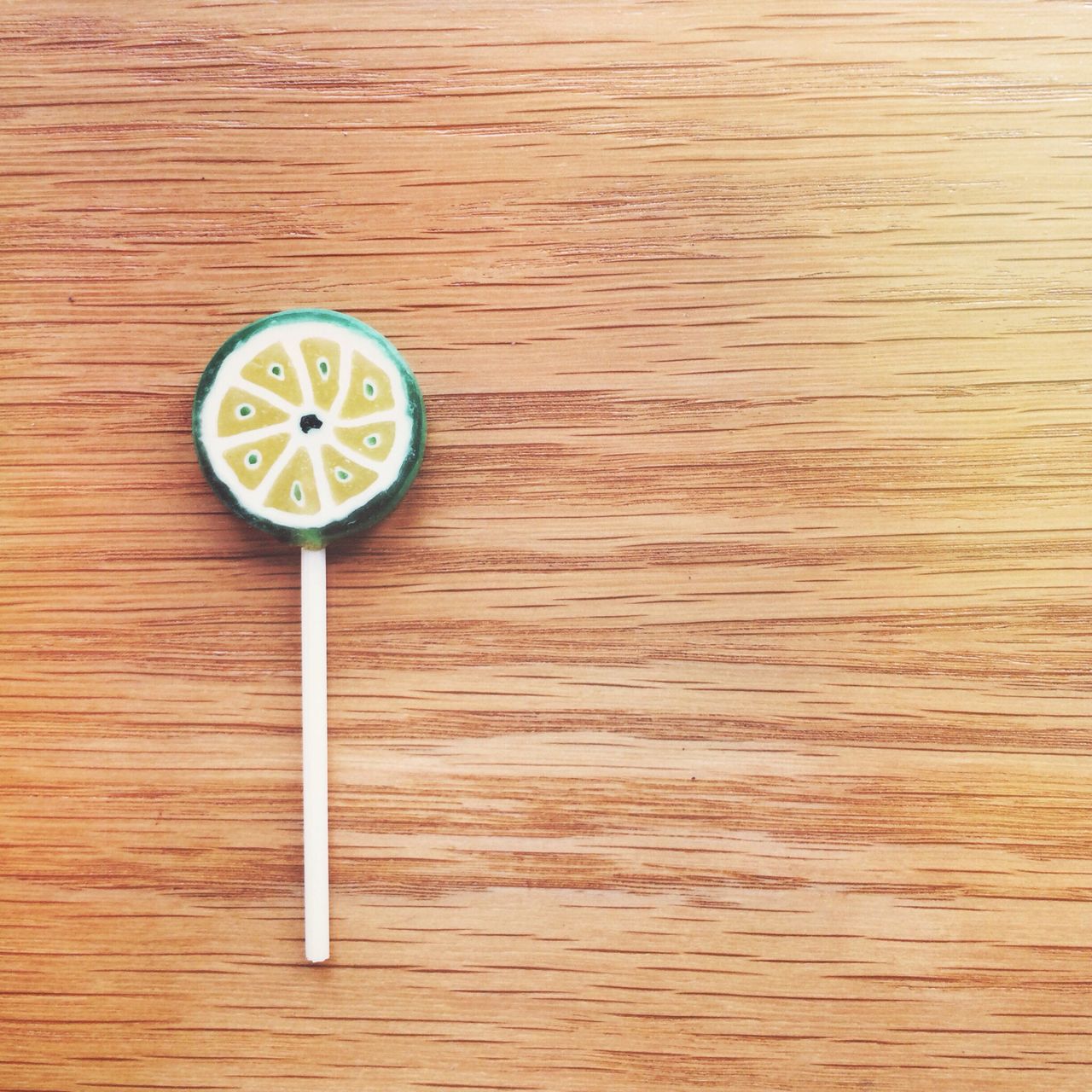 Lollipop on wooden table