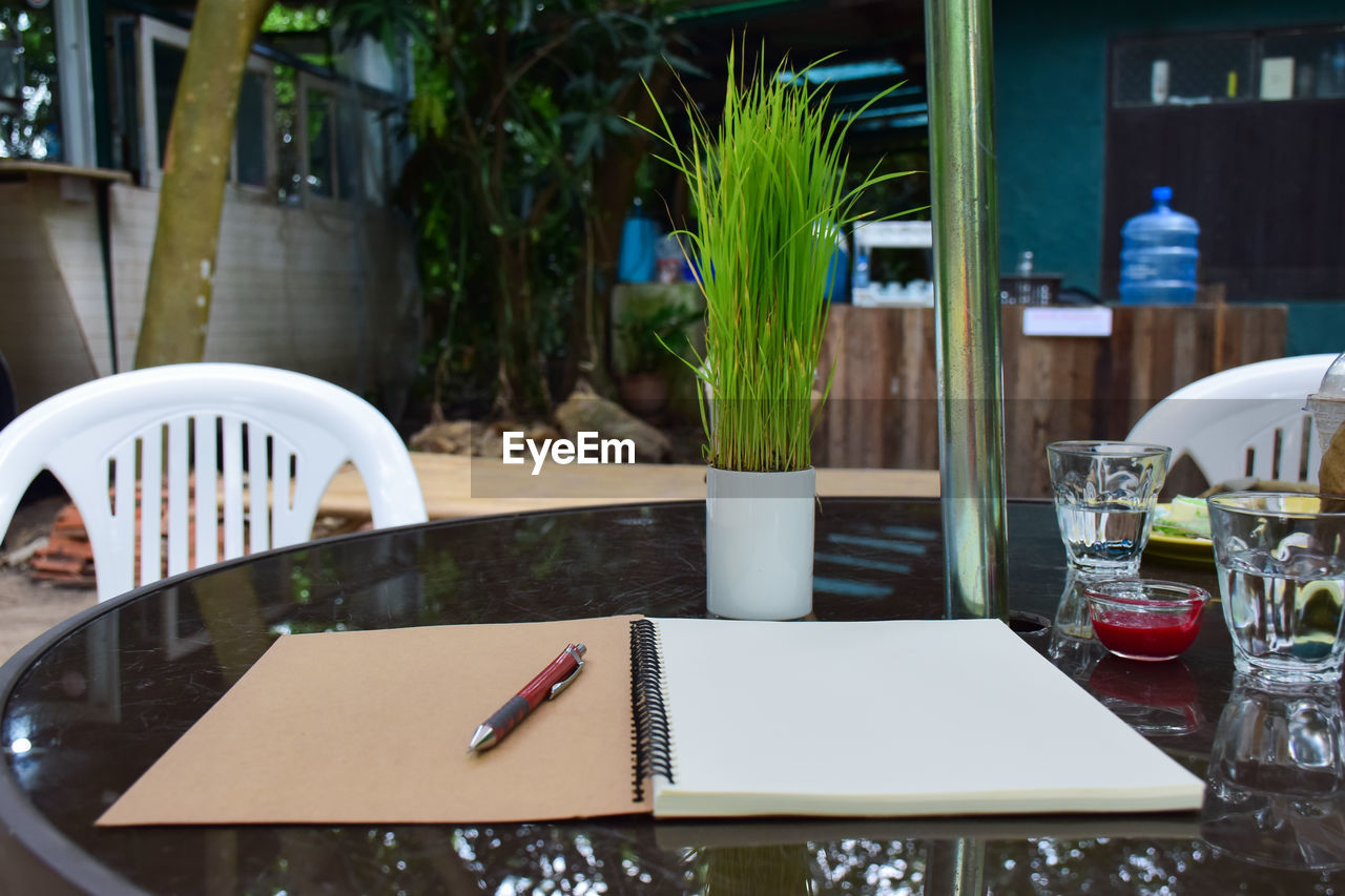 Empty chairs and tables in restaurant