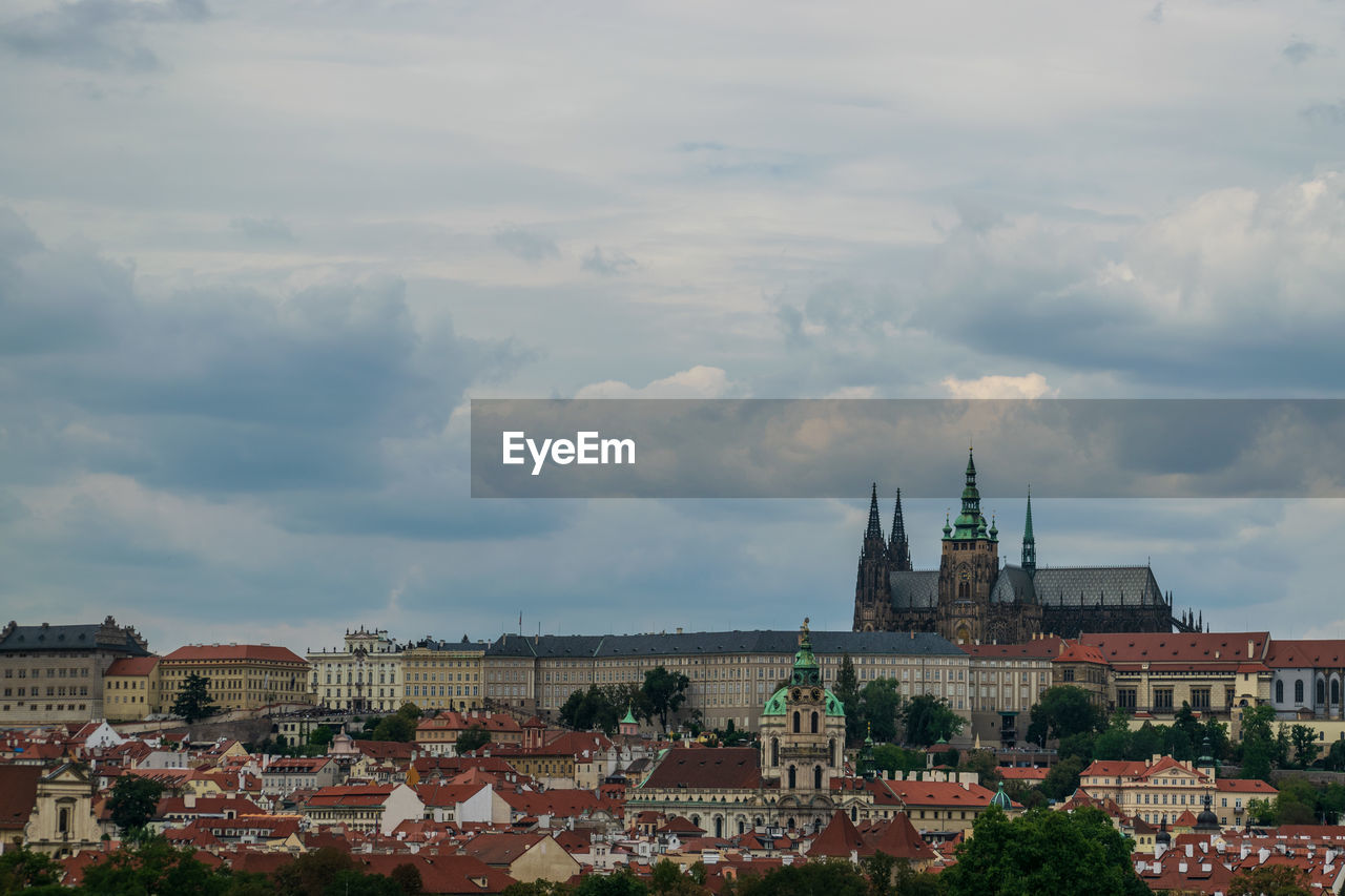 VIEW OF BUILDINGS IN CITY AGAINST SKY