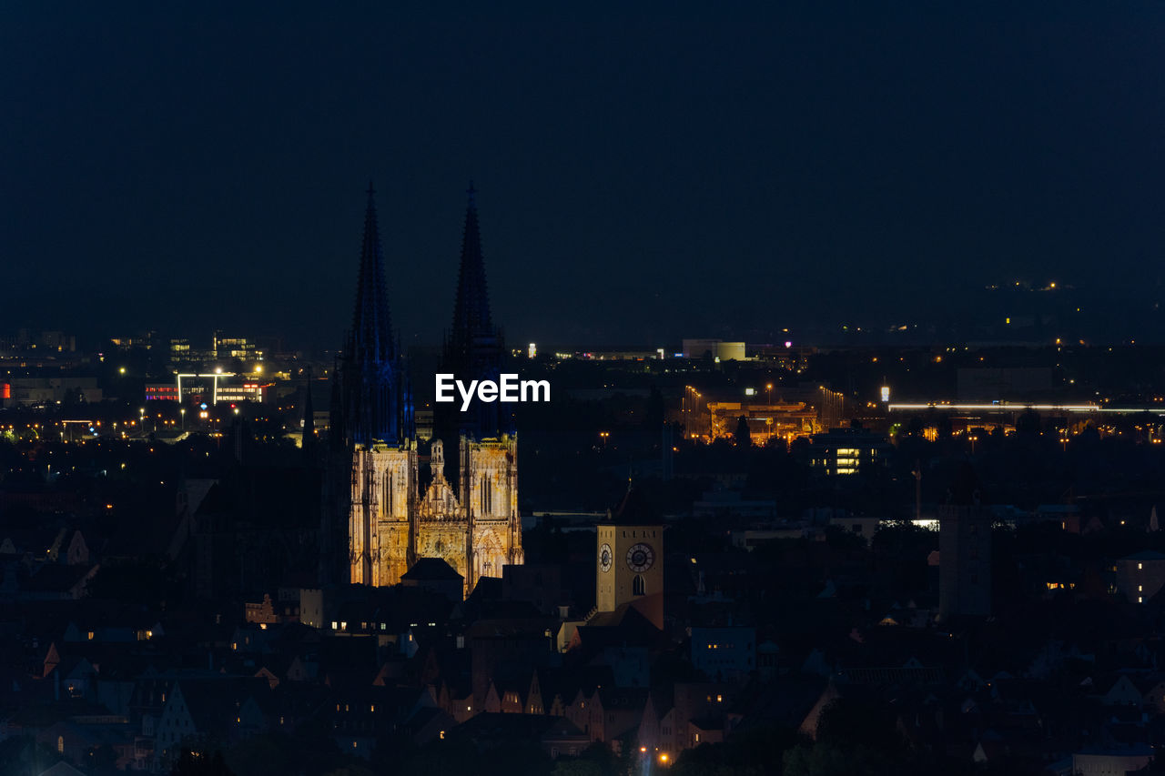ILLUMINATED BUILDINGS AT NIGHT