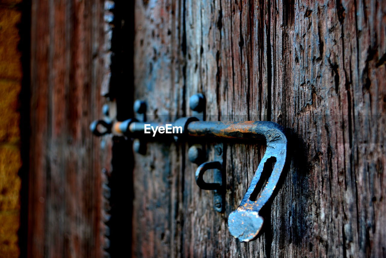 CLOSE-UP OF METAL DOOR