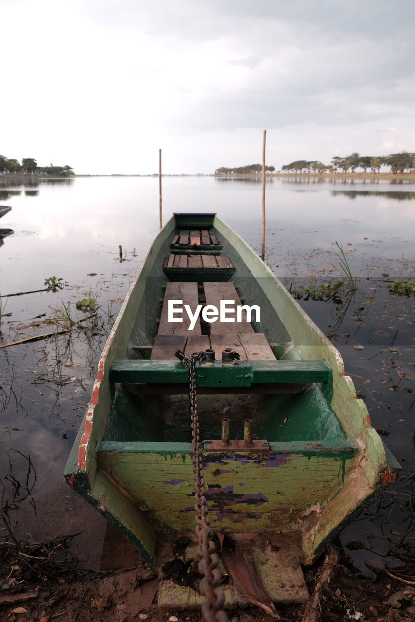 High angle view of boats moored in lake against sky