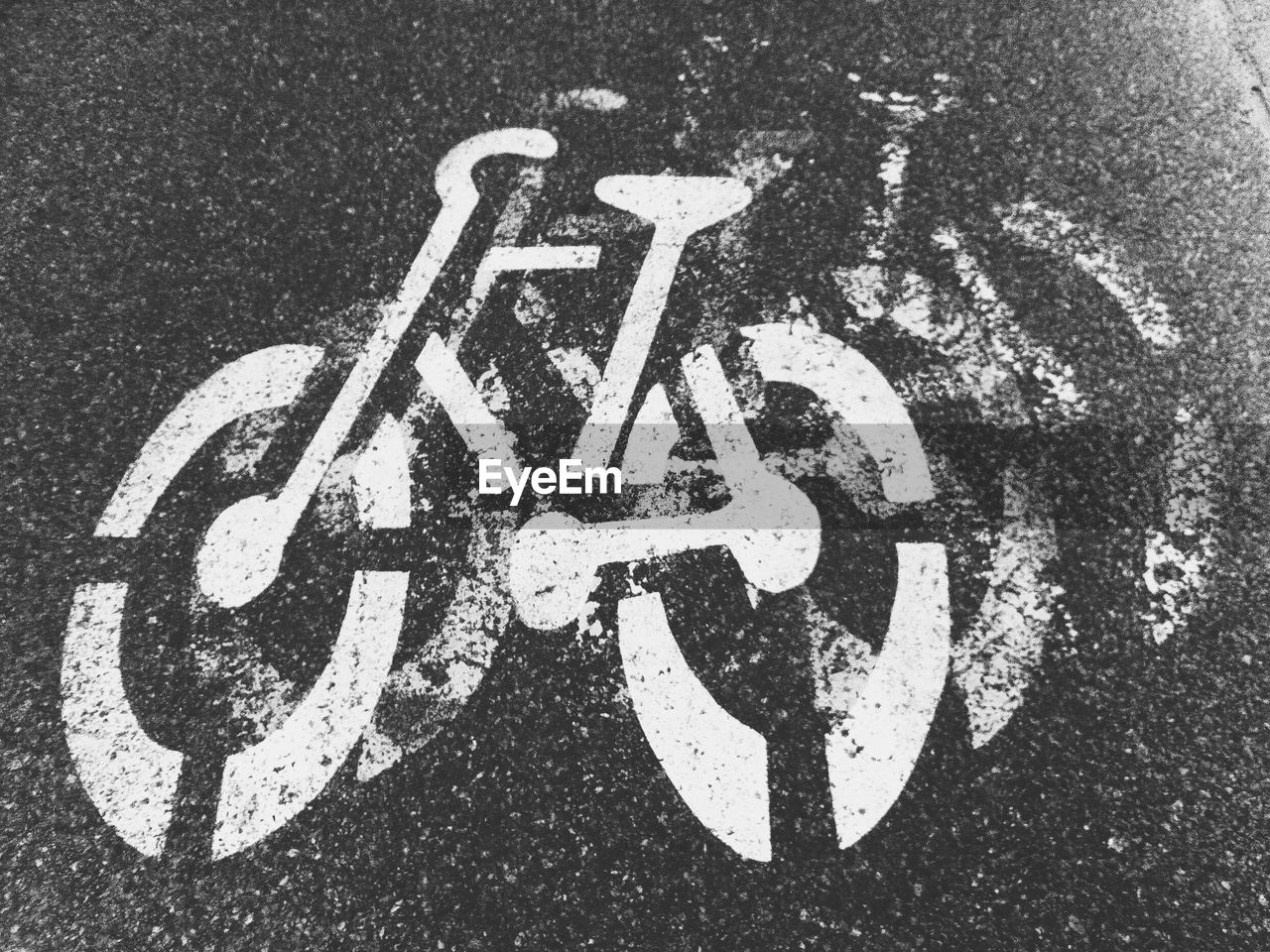 High angle view of bicycle lane sign on road