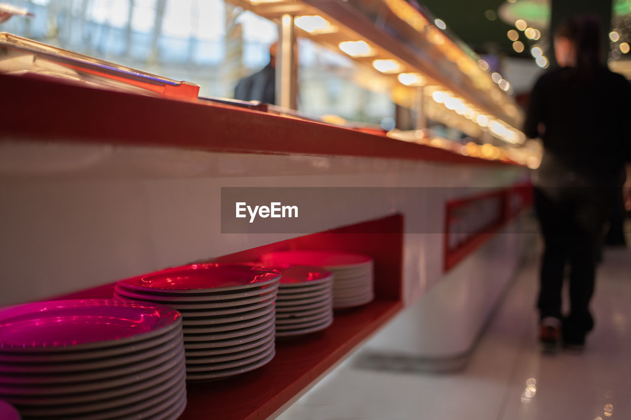 Low angle view of counter with food at asian buffet restaurant