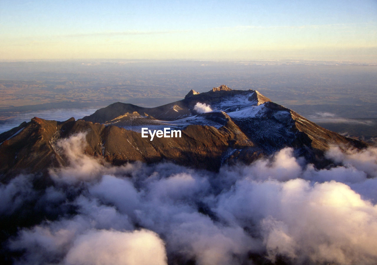 High angle view of mountain covered with clouds