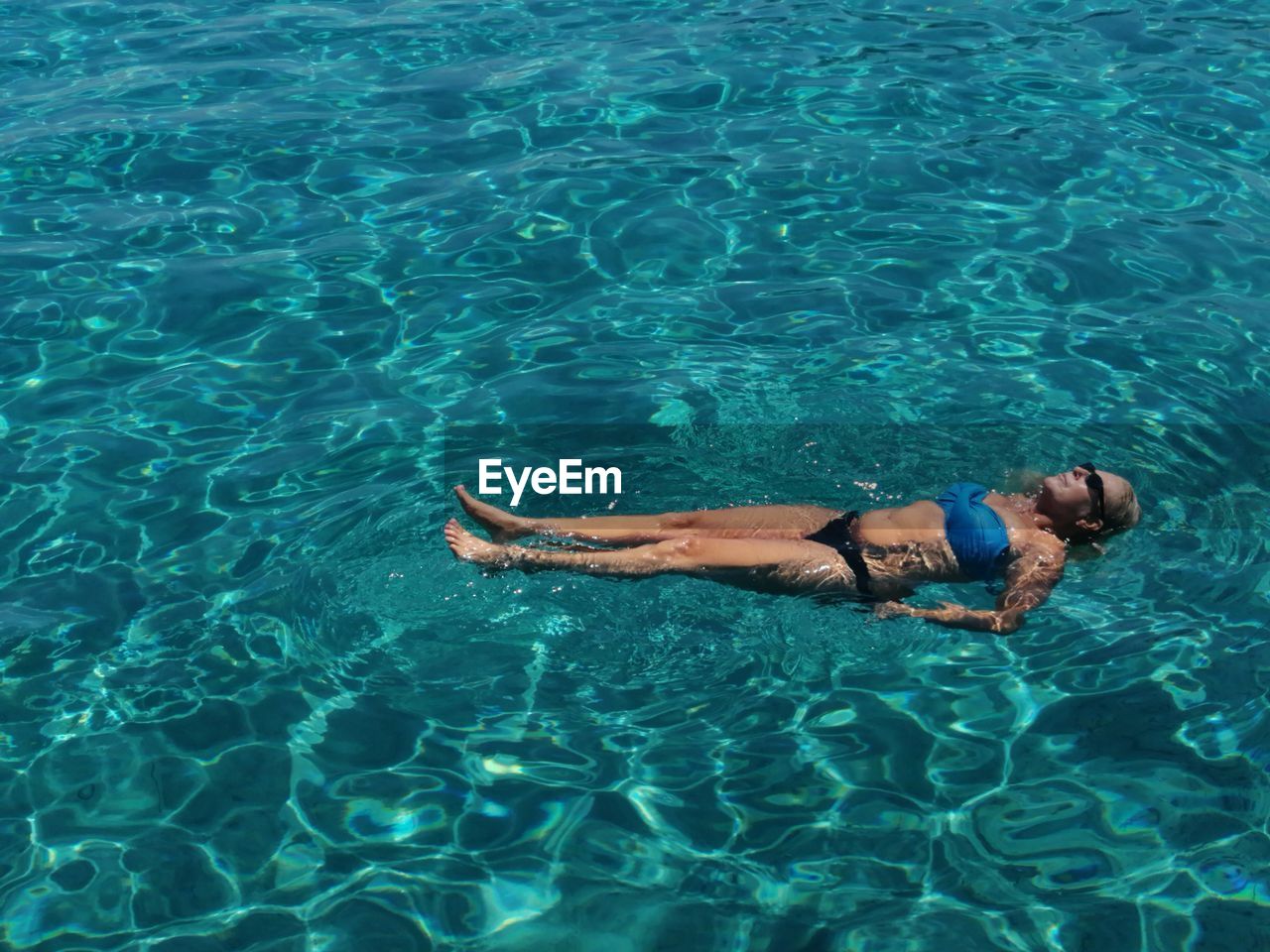 High angle view of man swimming in pool