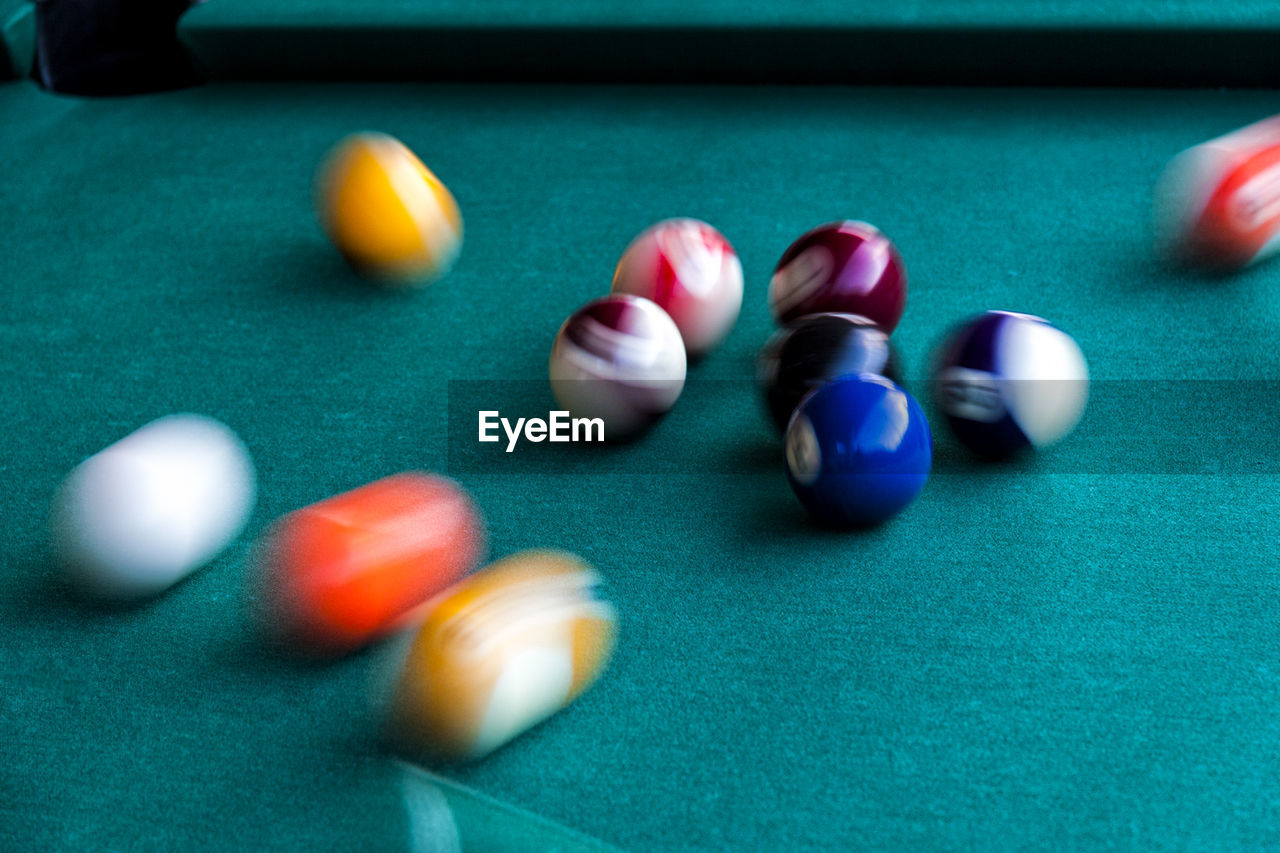 Close-up of multi colored water on table