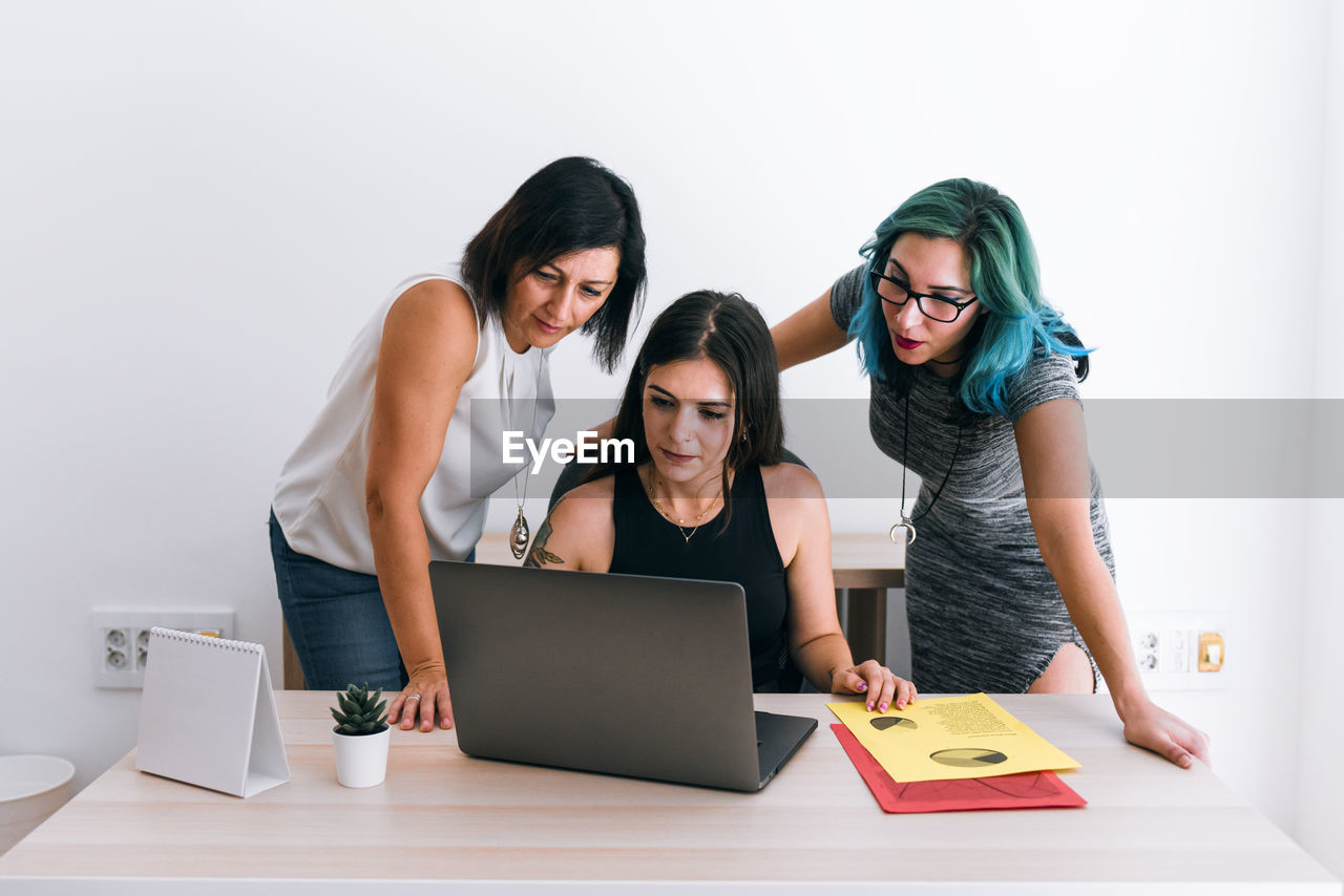 Young business women working in a coworking office