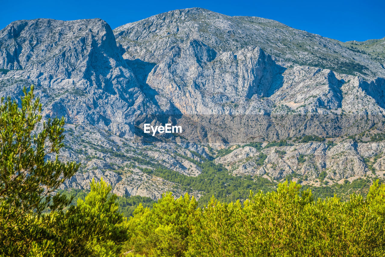 Scenic view of rocky mountains against sky