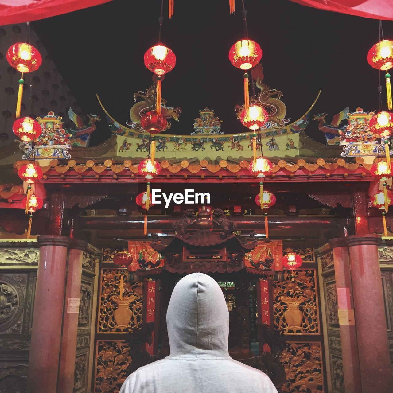 Rear view of man in temple