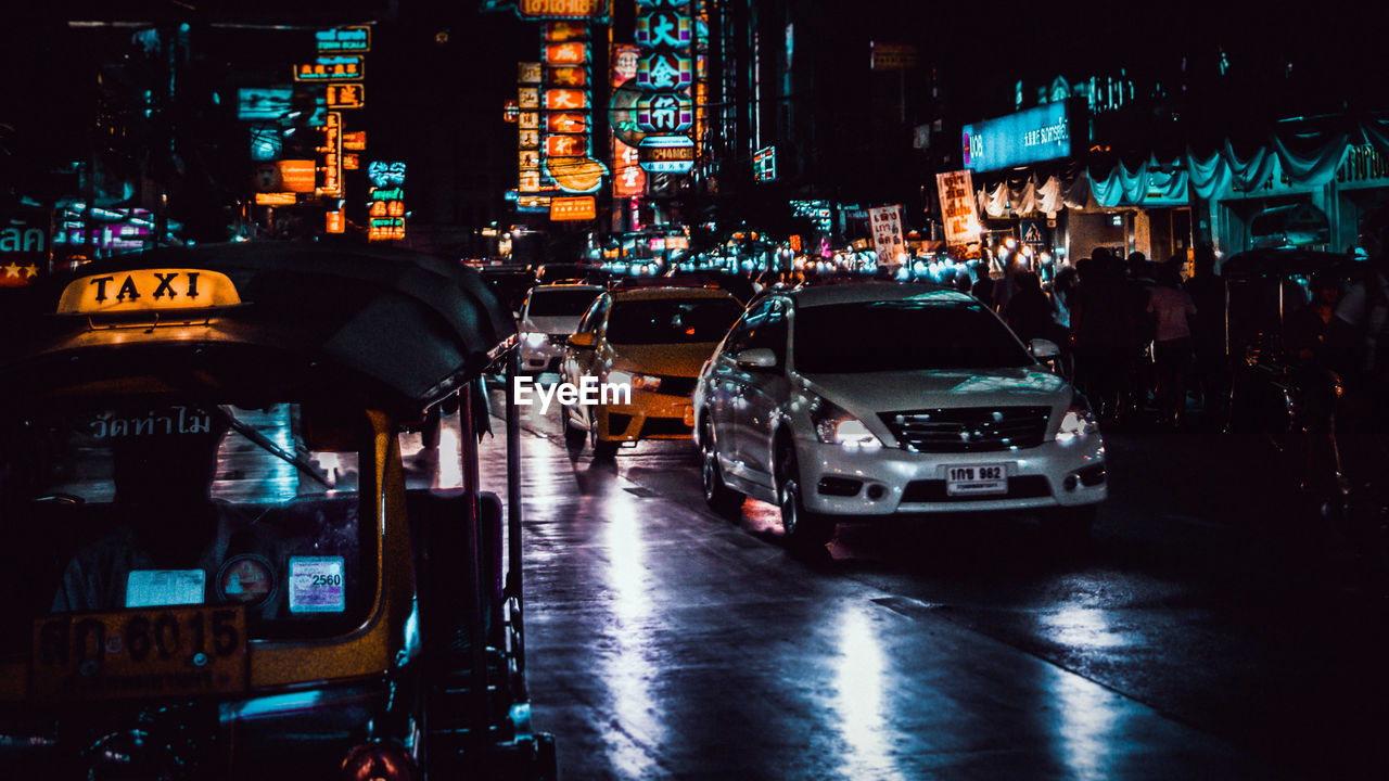 TRAFFIC ON ROAD AT NIGHT