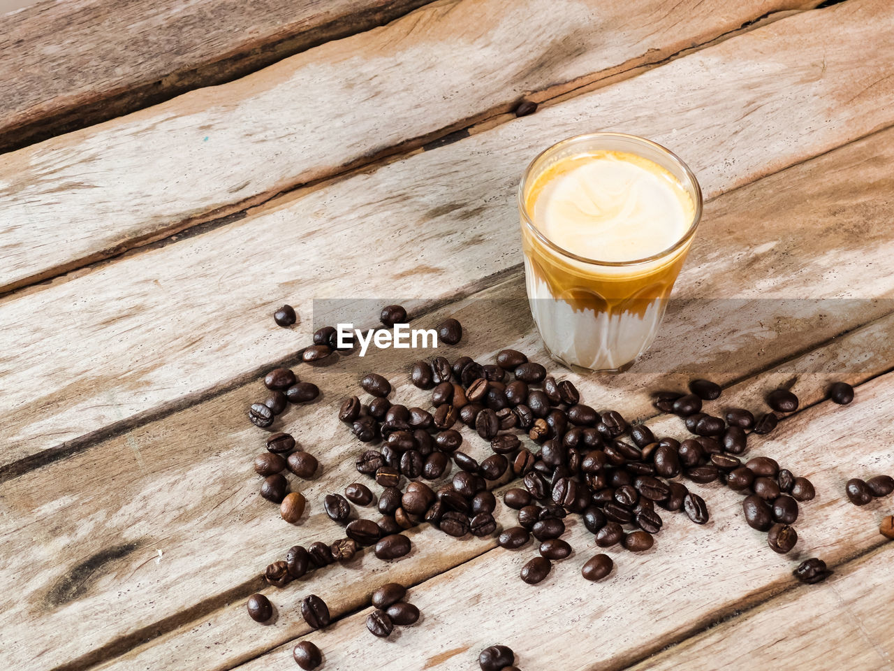 CLOSE-UP OF COFFEE CUP ON TABLE