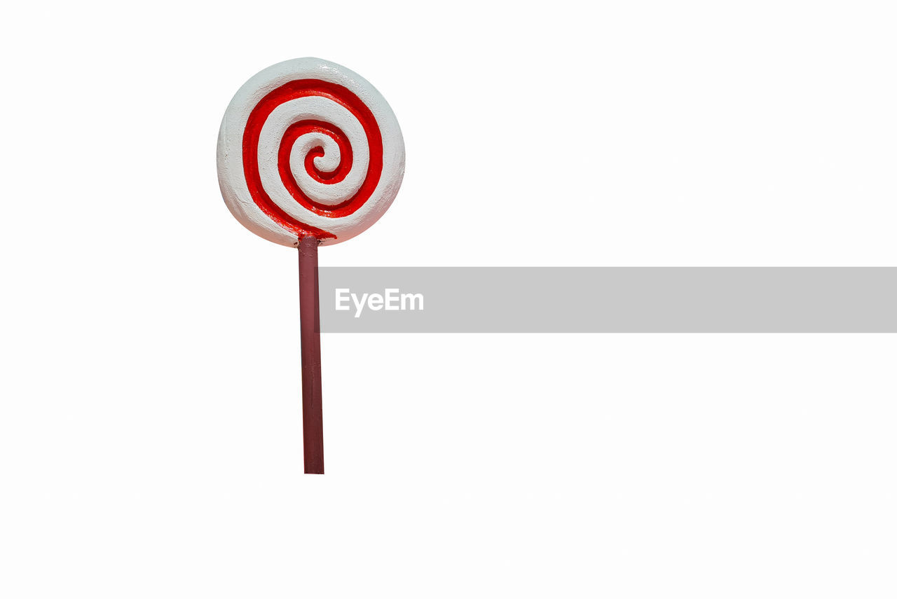 lollipop, white background, copy space, studio shot, red, no people, indoors, candy, food and drink, sweet food, food, sweet, cut out, dessert, spiral, white
