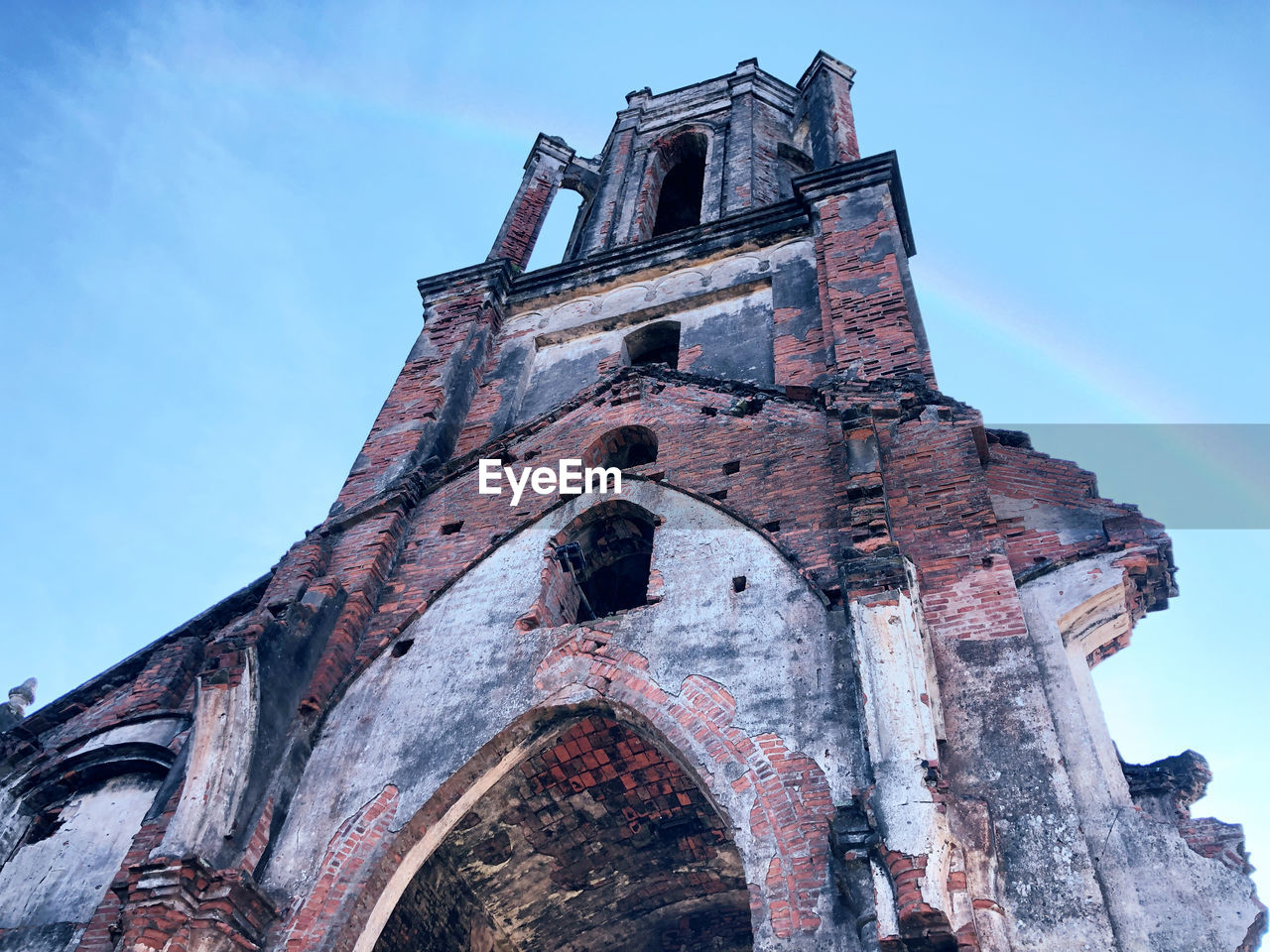 Low angle view of old building against sky