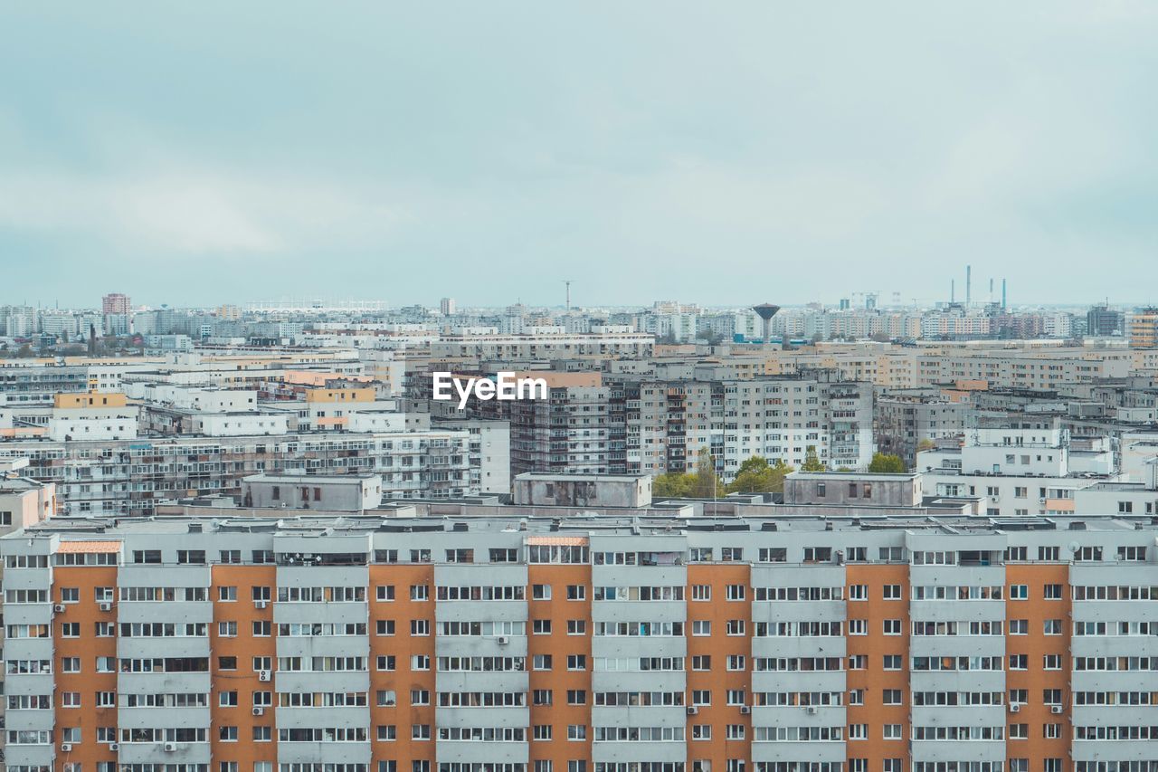 Close-up of cityscape against sky