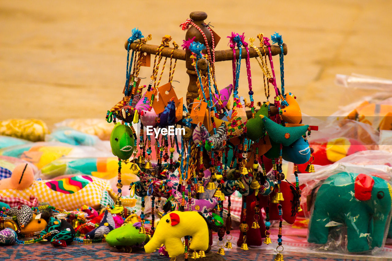 Close-up of toys for sale at market 