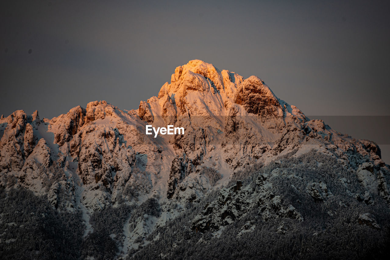 Sunrise at dolomite mountains