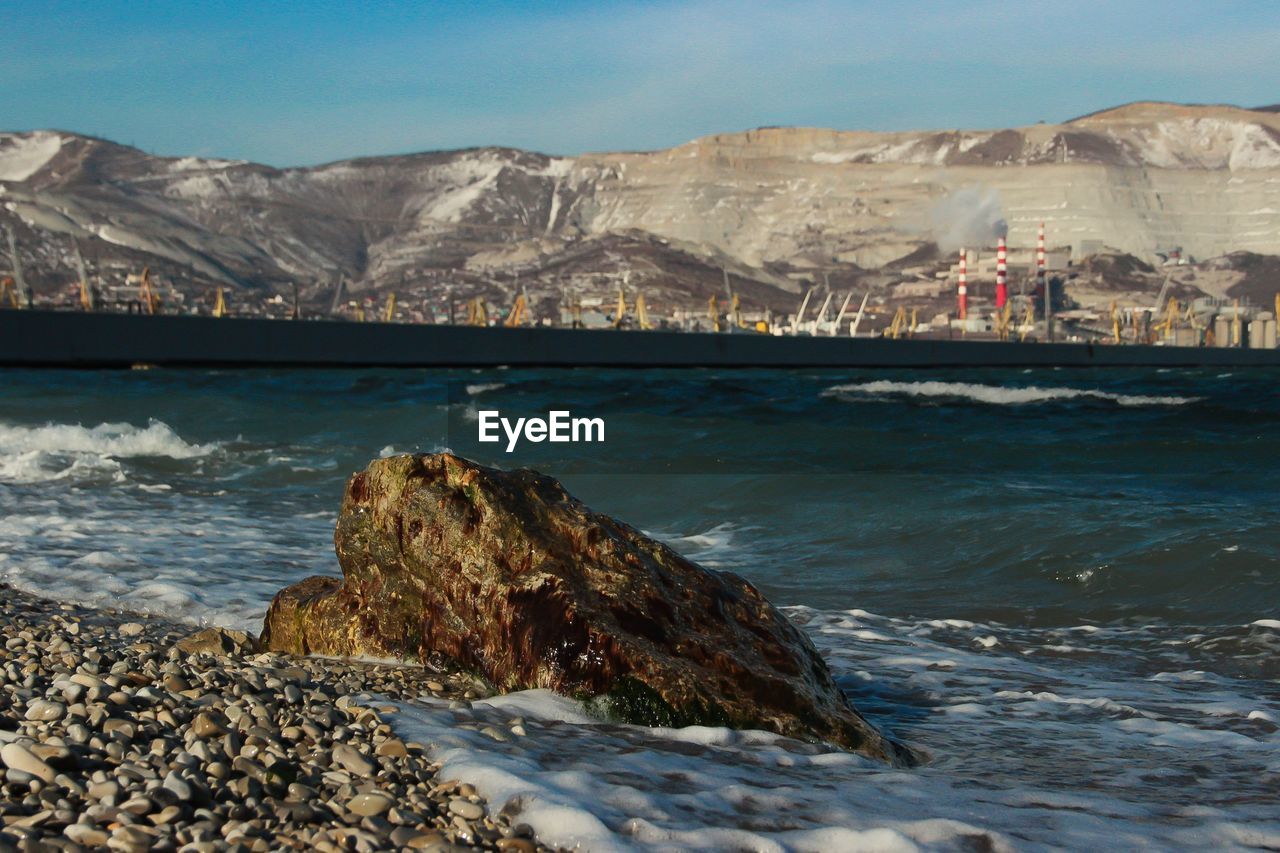 SCENIC VIEW OF SEA AND ROCKS