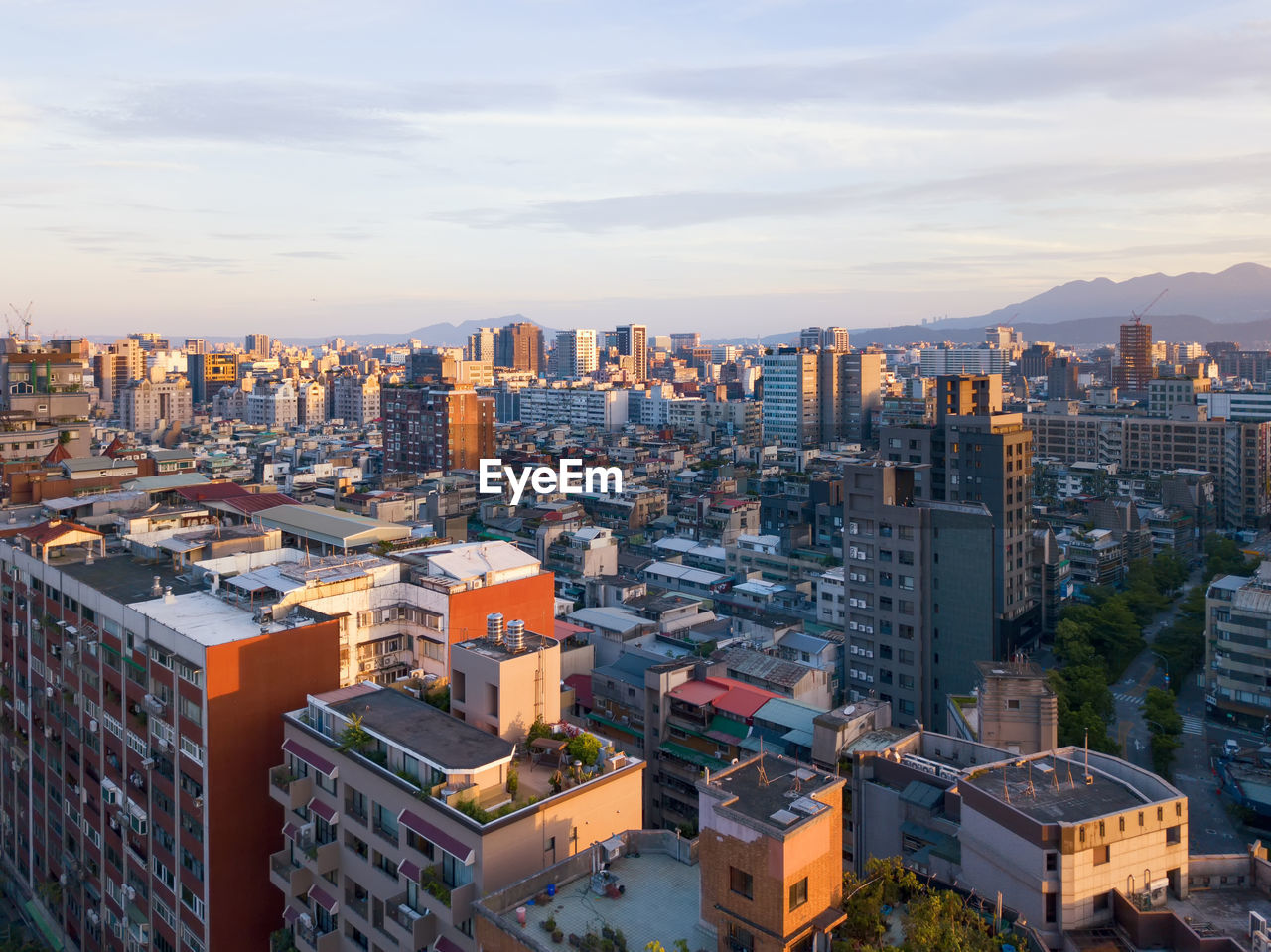 High angle view of buildings in city against sky