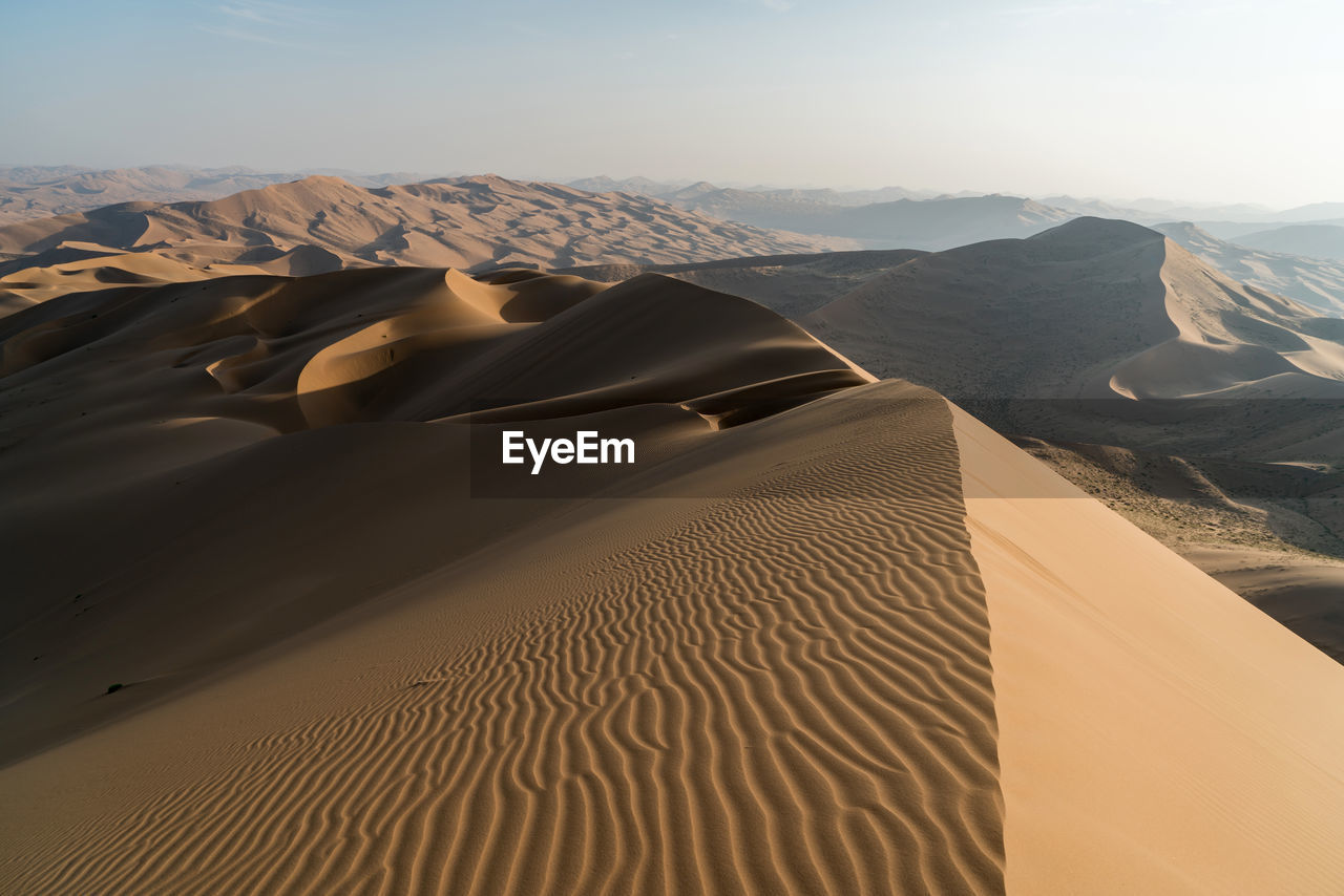 View of badain jaran desert against sky
