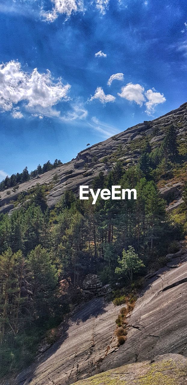 SCENIC VIEW OF MOUNTAIN AGAINST SKY