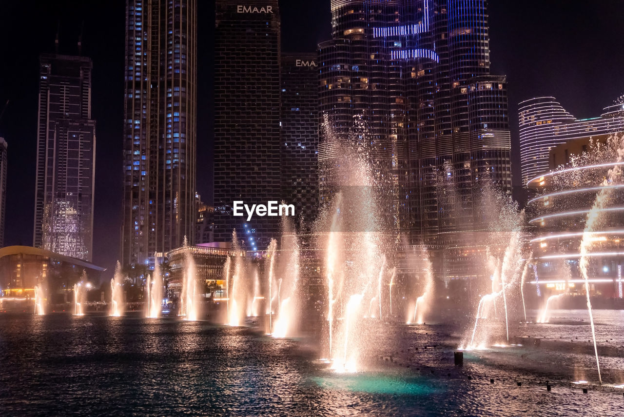 Burj khalifa skyscraper at night in dubai.