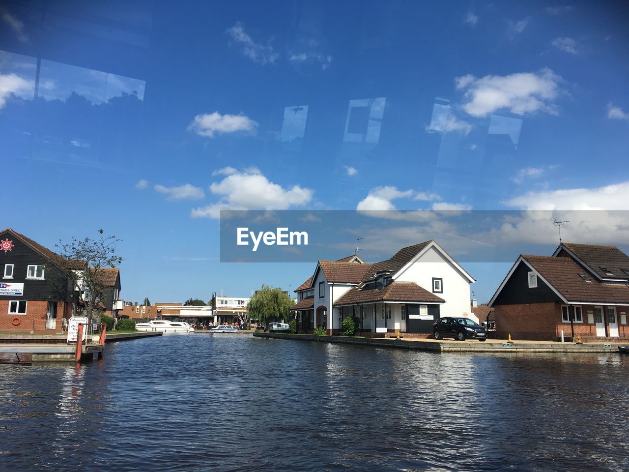 HOUSES AGAINST SKY