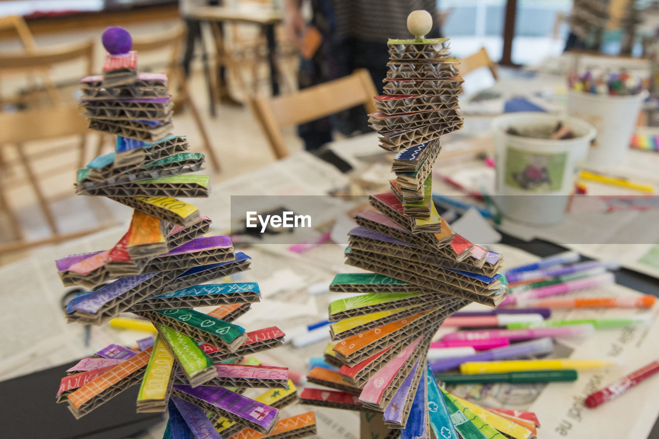 Close-up of colorful artwork on table