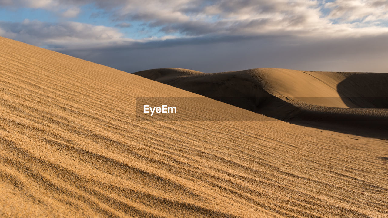 Scenic view of desert against sky