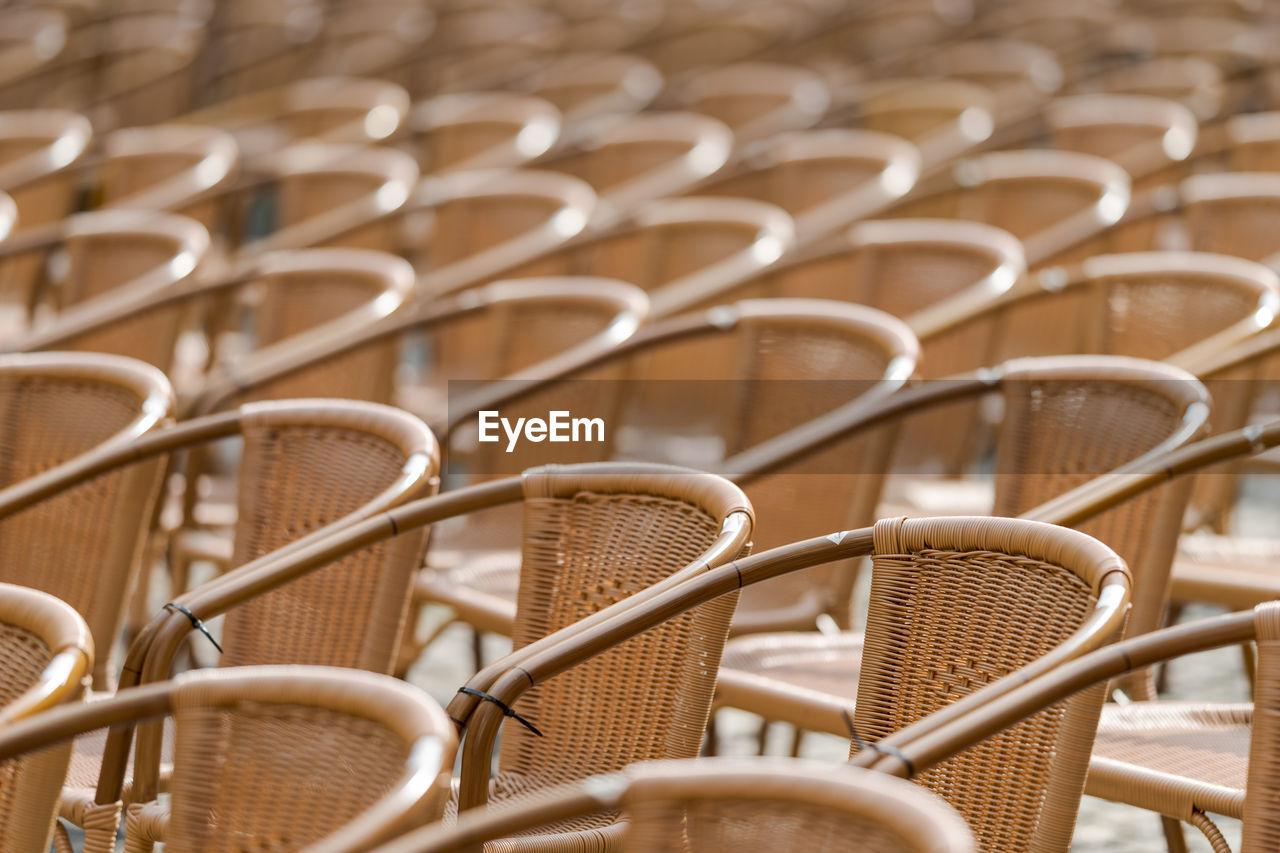 FULL FRAME SHOT OF WICKER CHAIRS